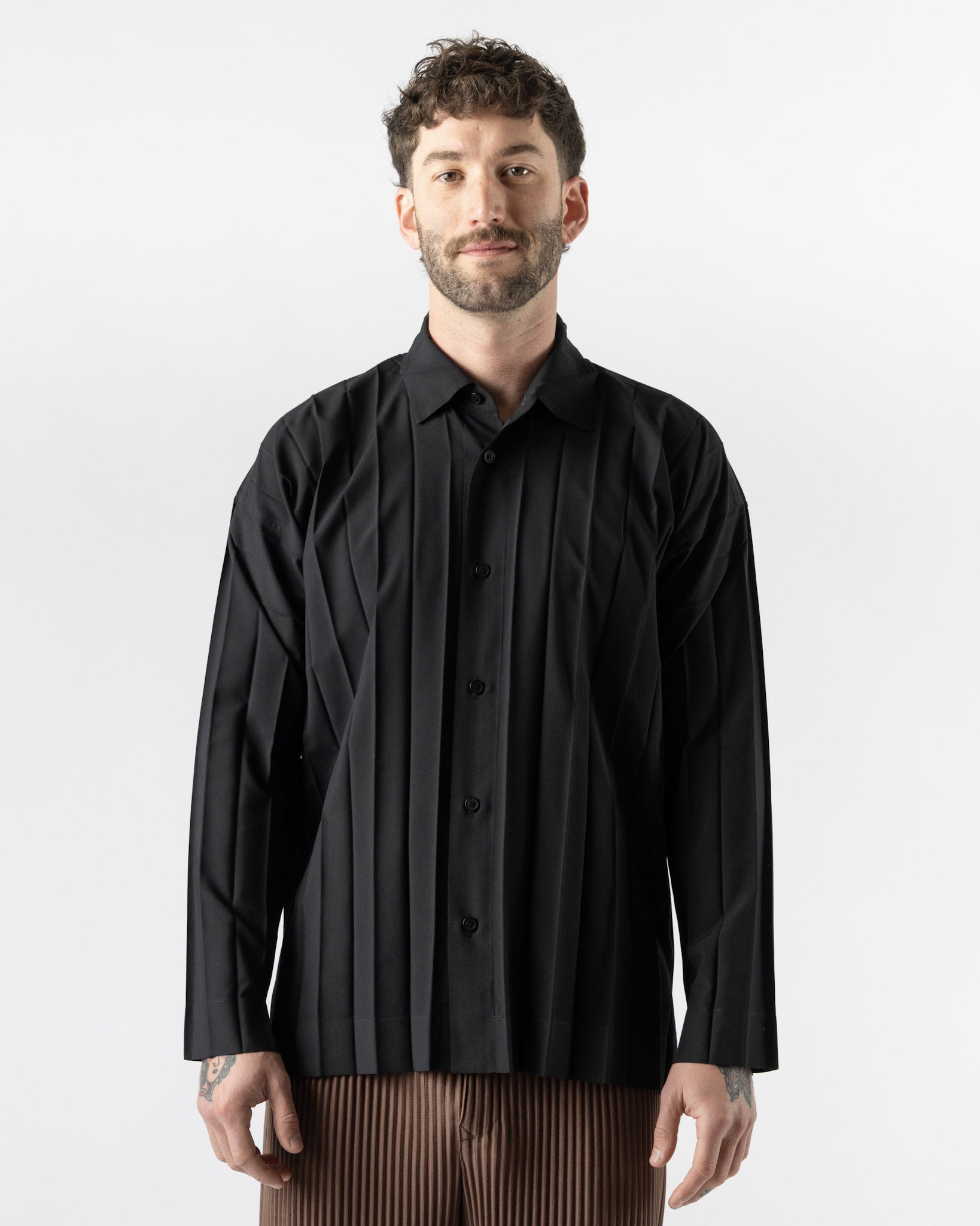 Homme Plissé Issey Miyake Edge Shirt in Black Curated at Jake and
