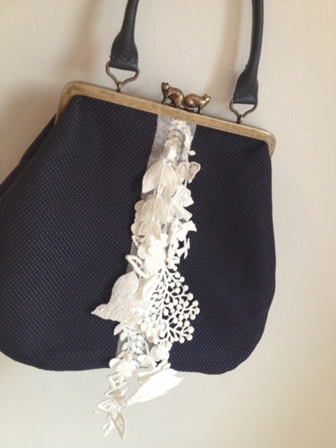 ミナ ペルホネン☆がま口バッグ | moon face