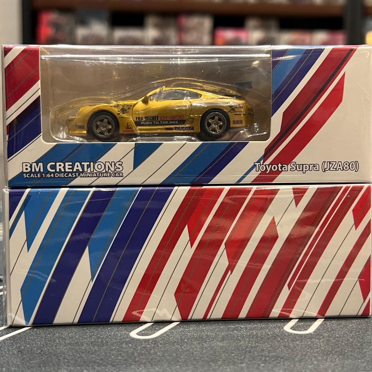 BM Creations 1/64 Toyota Supra Gold (JZA80) SINOPEC HONG KONG
