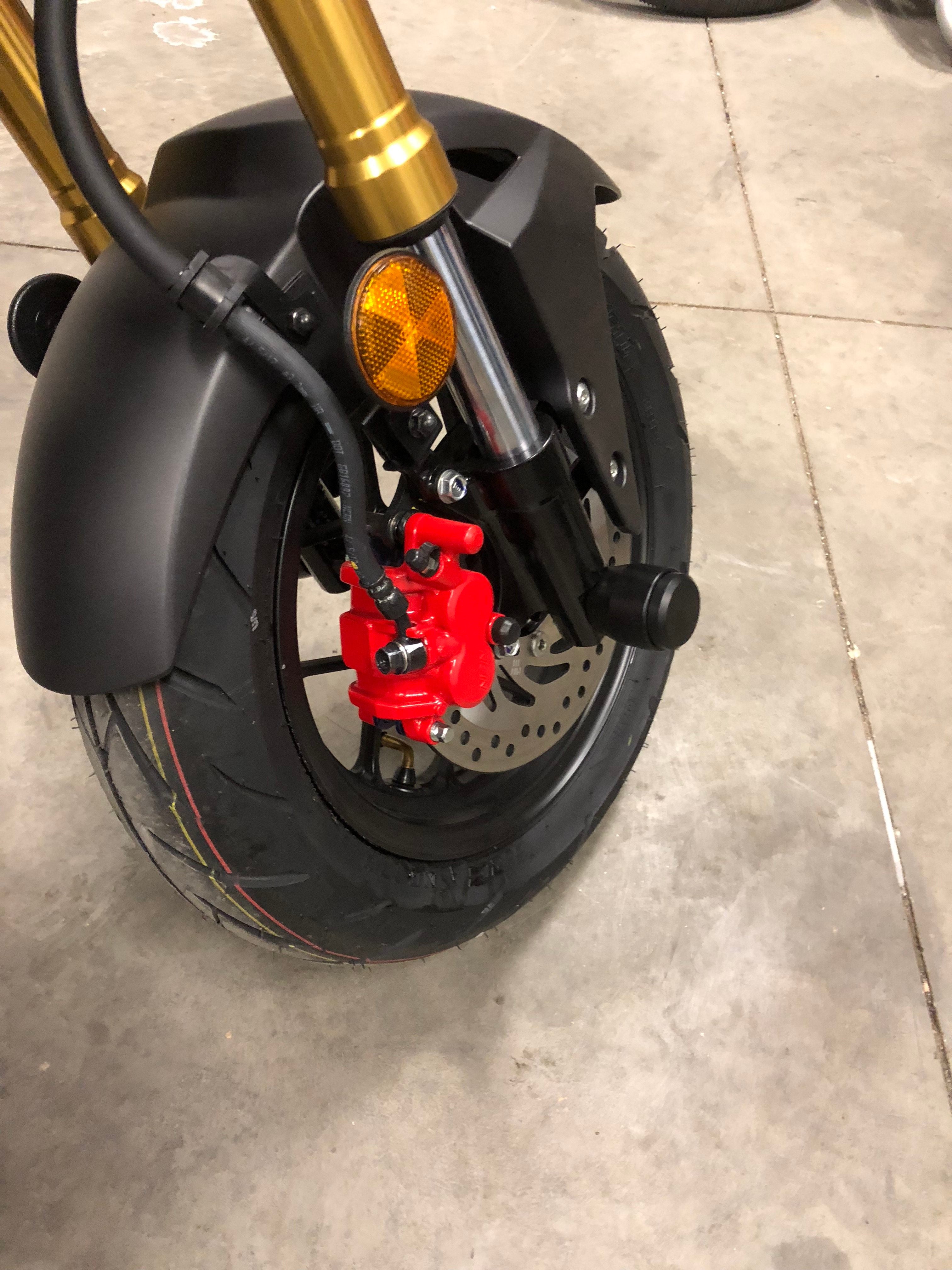 StuntPucks Kawasaki Z125 Pro Axle Sliders – The Sic Shop LLC