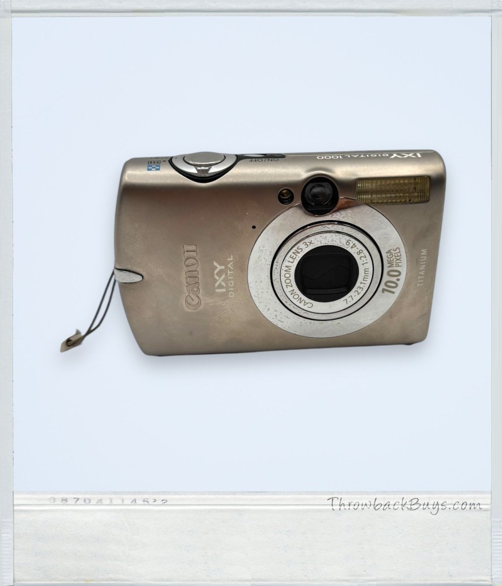 2006 – Canon IXY Digital 1000 Titanium 10MP Point & Shoot Camera w