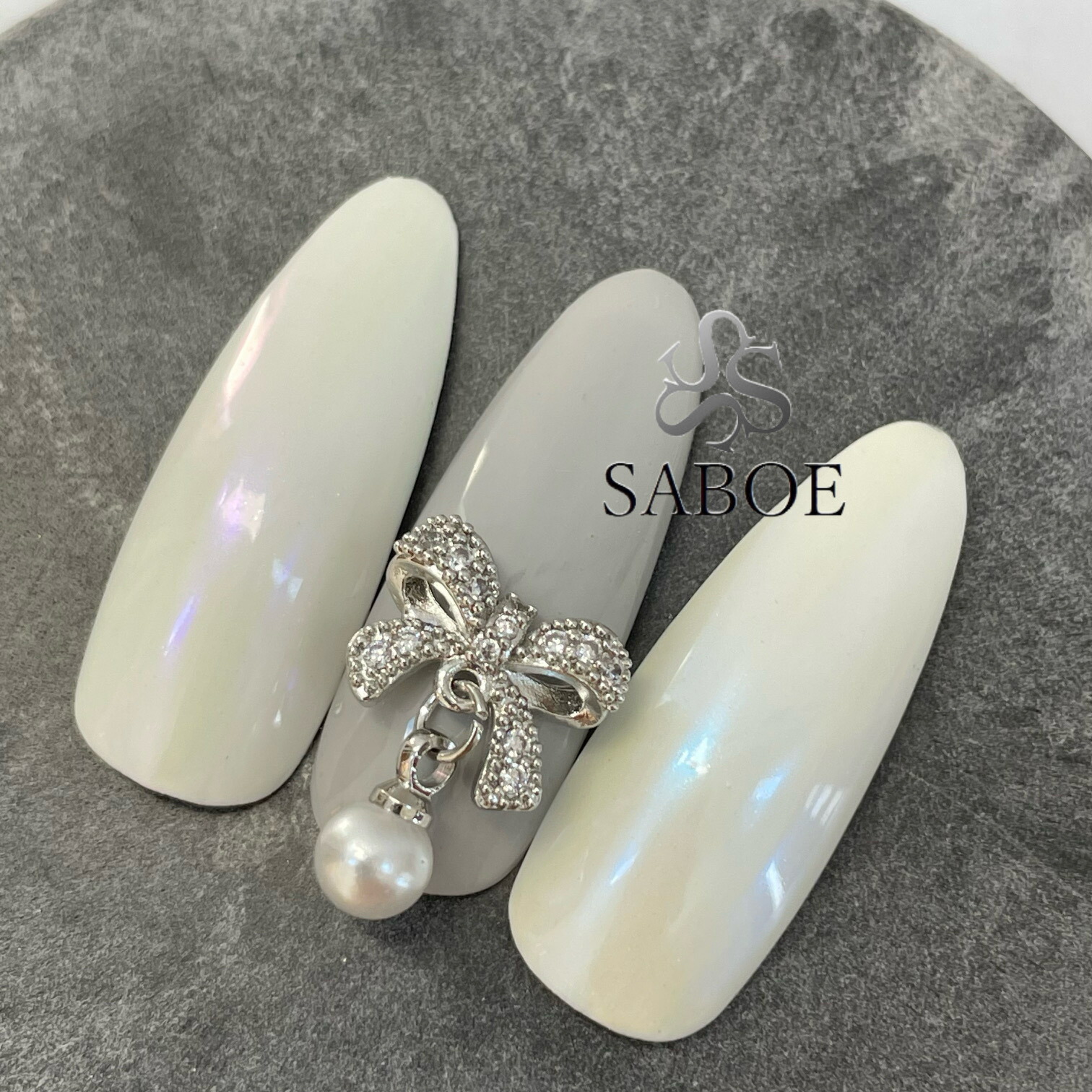 楽天市場】ネイルパーツ 【1個】リボン ジルコニアストーン 揺れる