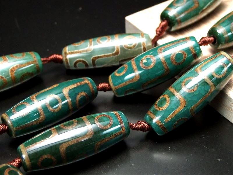 楽天市場】○龍の鱗模様【九眼緑龍紋天珠(くがんりゅうもんてんじゅ