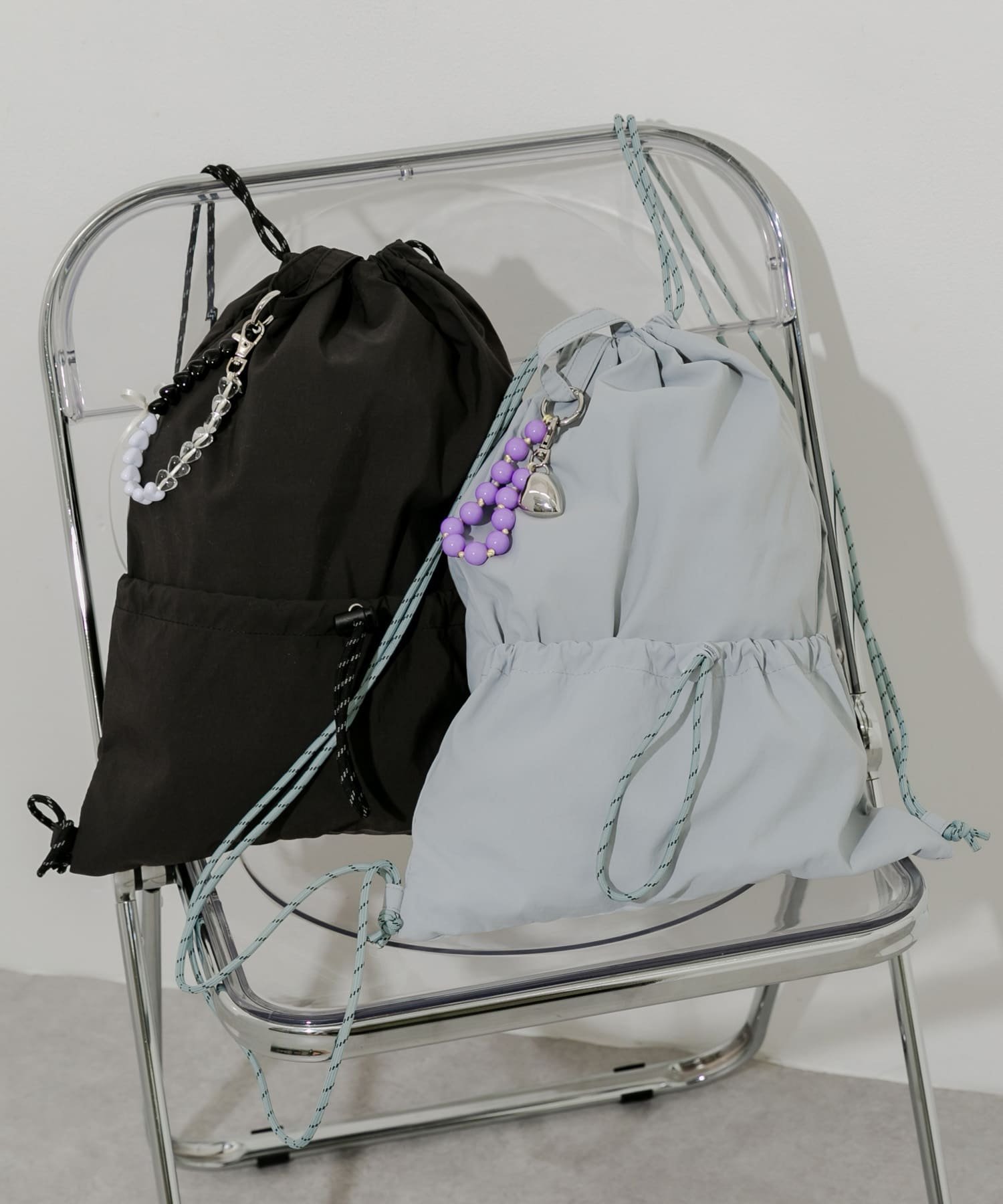 SMELLY｜ドロストポケットナップサック | Rakuten Fashion(楽天