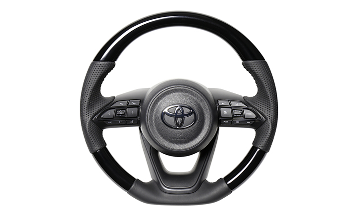 アクアK10系用コンビステアリング・ピアノブラック REAL(レアル)｜AQUA