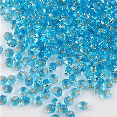 Miyuki 4mm Magatama Seed Bead Silver Lined Blue Topaz #18 – Aura