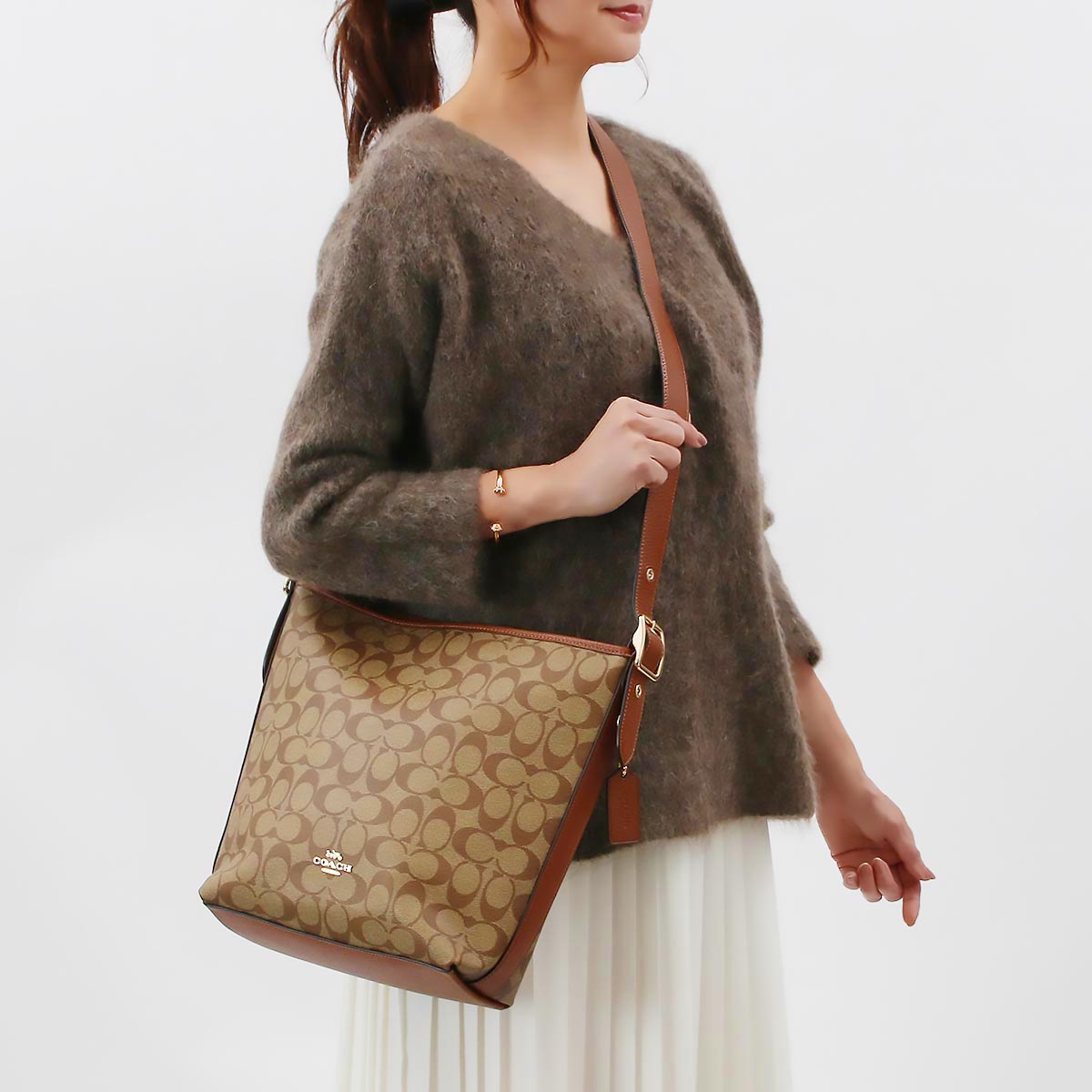 コーチ ショルダーバッグ/クロスボディ バッグ レディース ダッフル