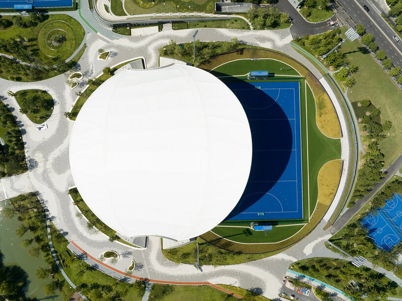 archi-tectonics tops field hockey stadium in hangzhou with 125
