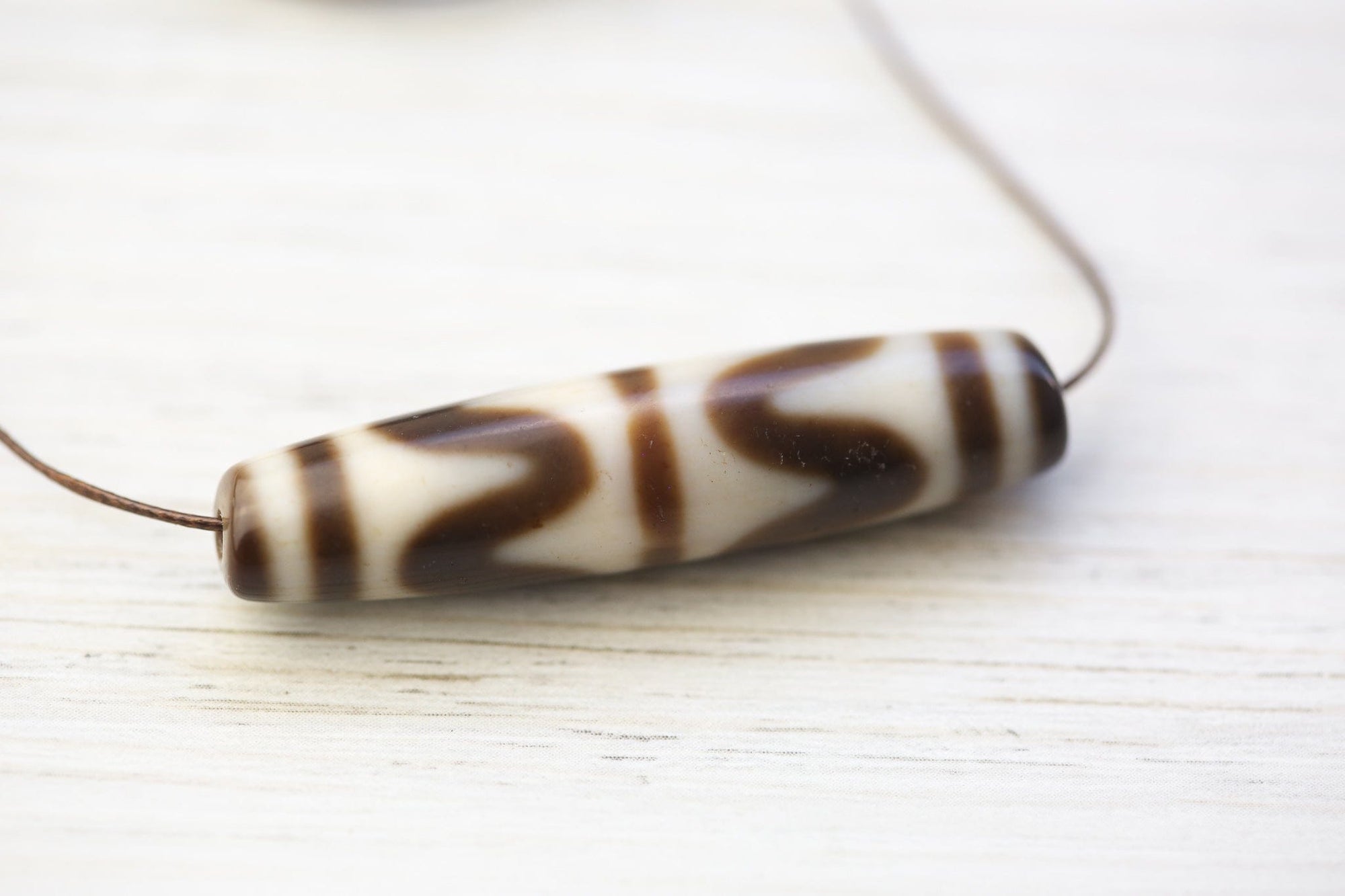 Tiger Tooth Dzi Bead for Protection - DharmaShop