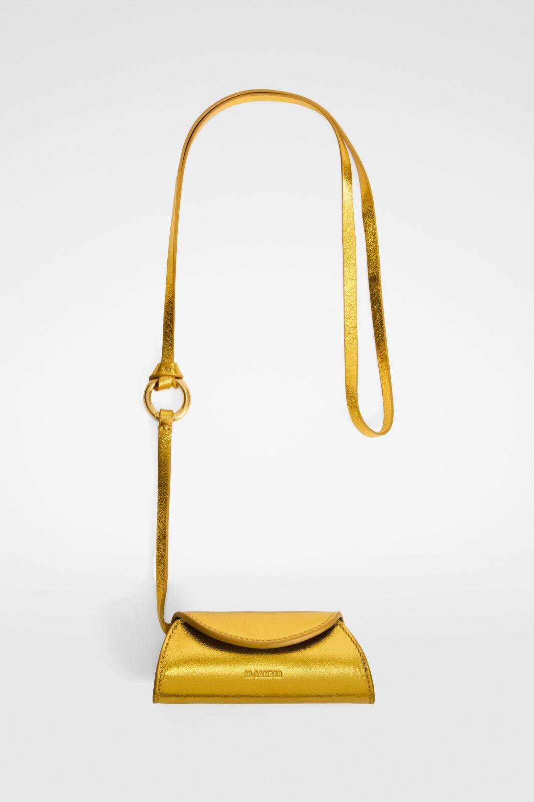 ジル サンダーのクリスマス、ゴールドに輝く「カンノーロ」リップ