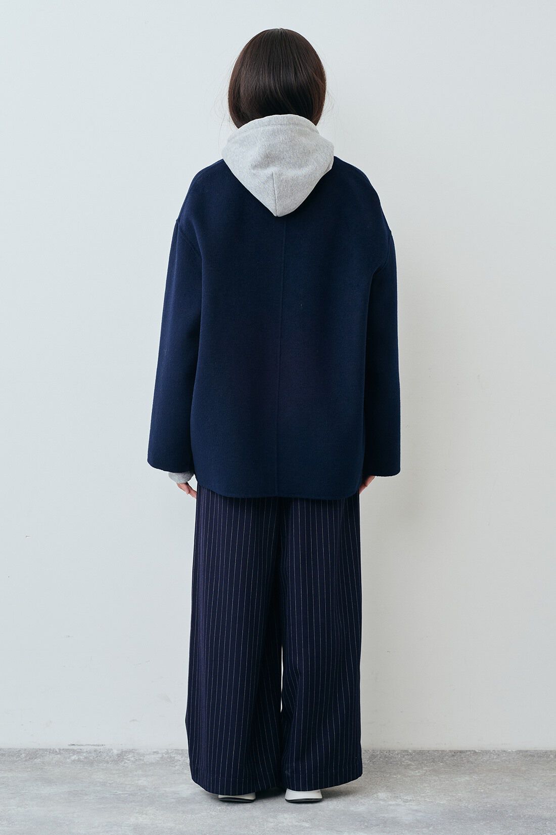 THREE FIFTY STANDARD リバー仕立てのウール混ノーカラーコート