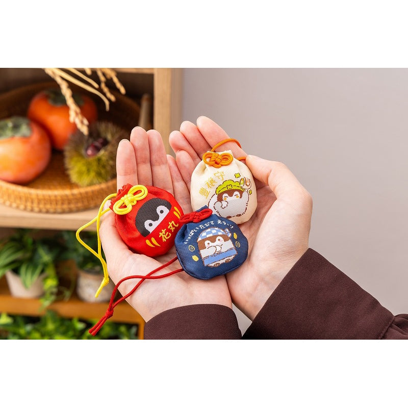 コウペンちゃん 収穫祭！ 巾着お守り（花丸だるま） – コウペンちゃん