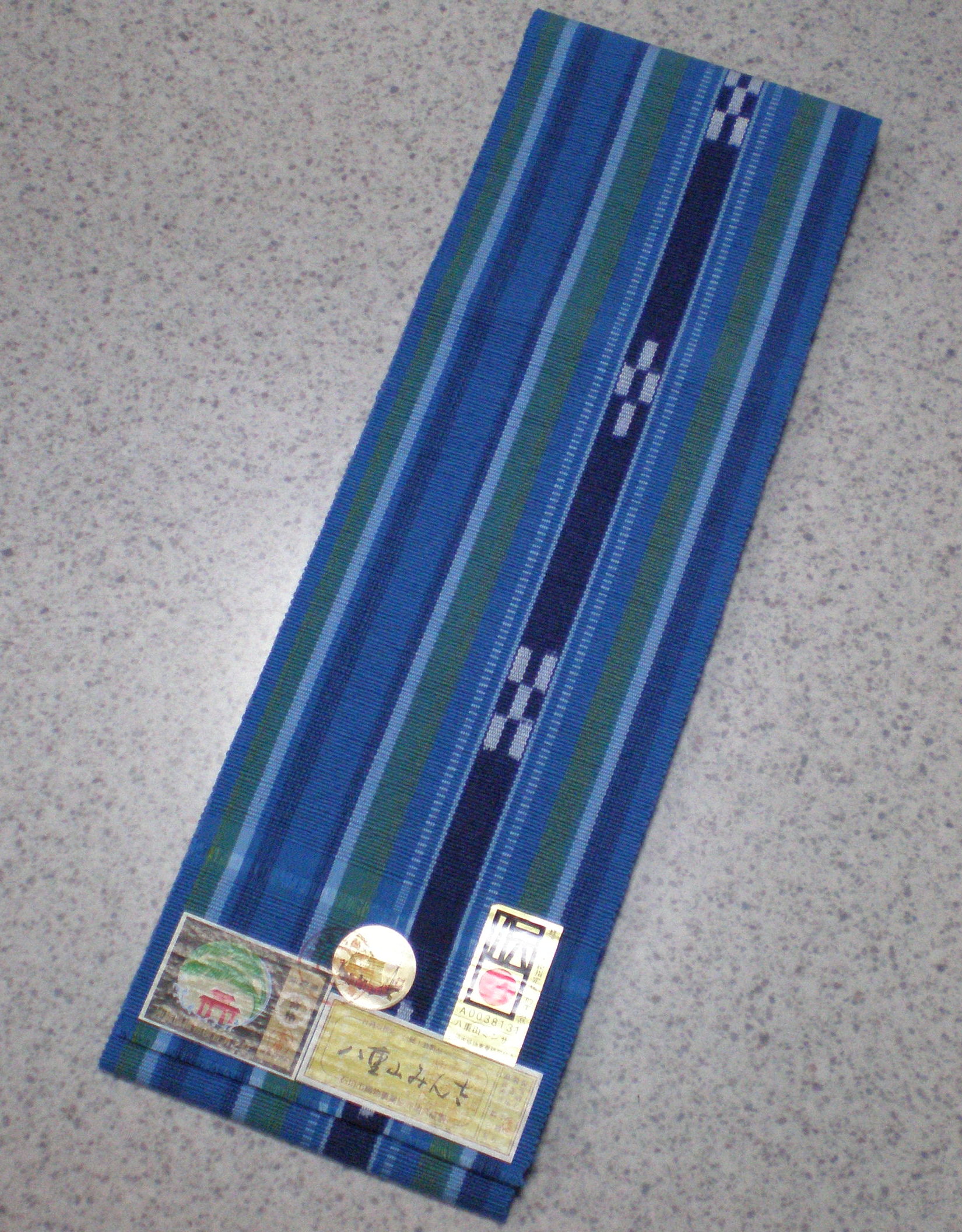八重山ミンサー織（半幅帯）青系縞柄紺絣 伝産マーク、石垣島産本場