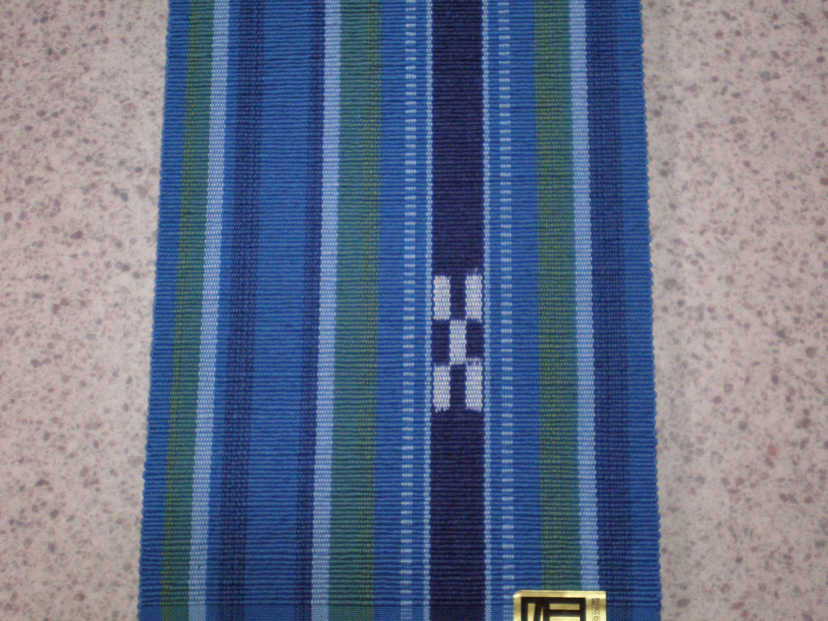 八重山ミンサー織（半幅帯）青系縞柄紺絣 伝産マーク、石垣島産本場