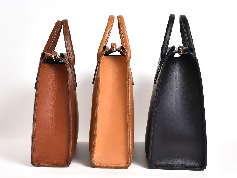 三角マチで収納量を高めたファスナー式二本手ビジネスバッグ / 革鞄の