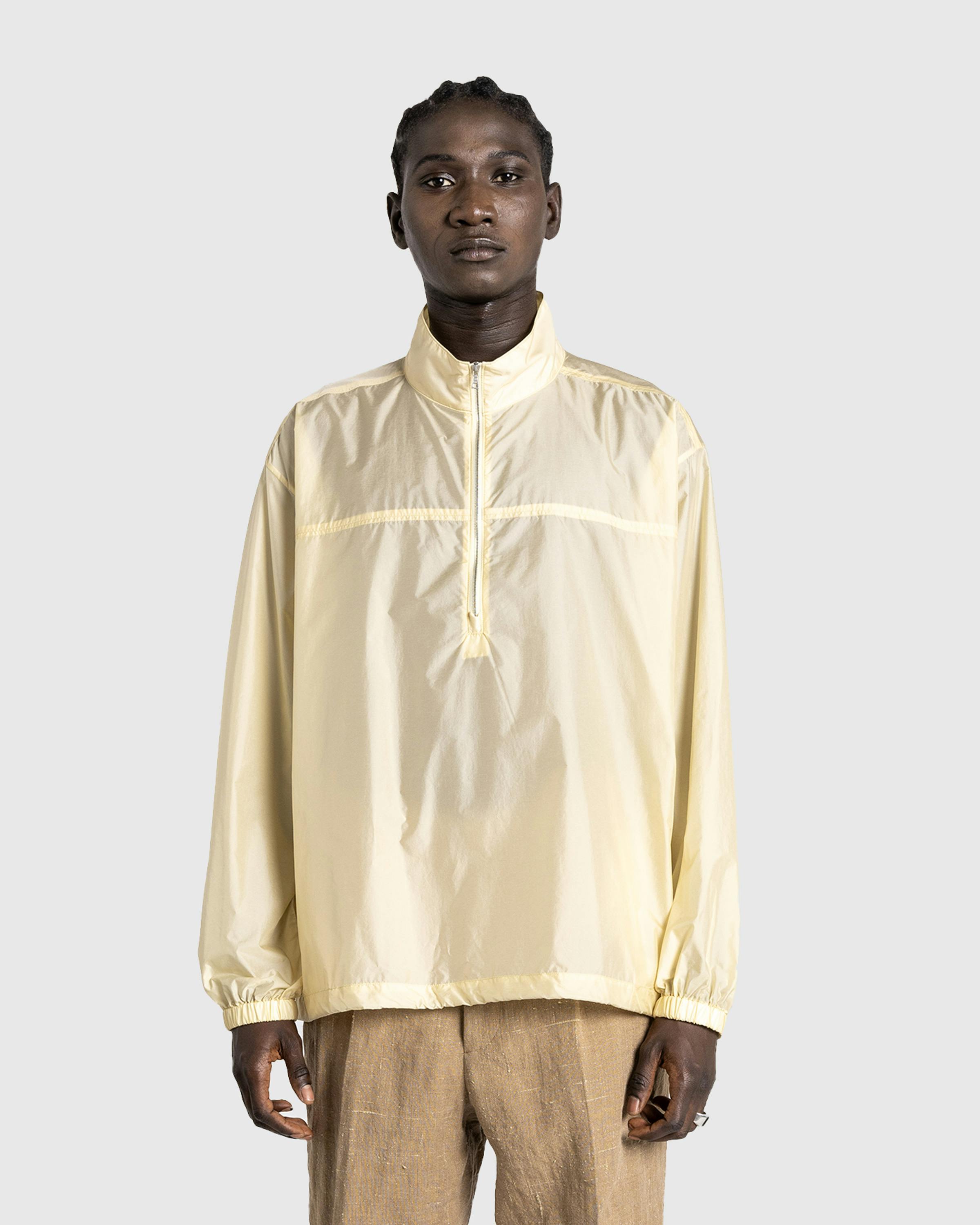 Auralee – Light Nylon Half Zip P/O Light Yellow