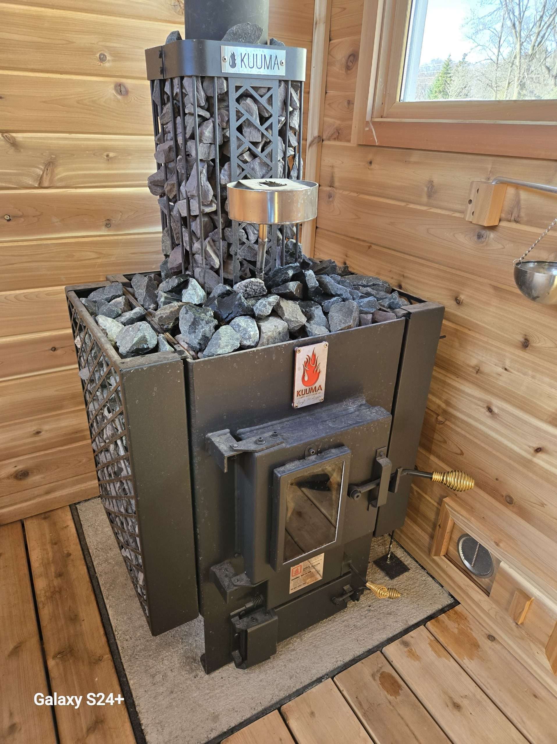Chris and Jayne's Kuuma Wood Sauna features a medium Kuuma stove