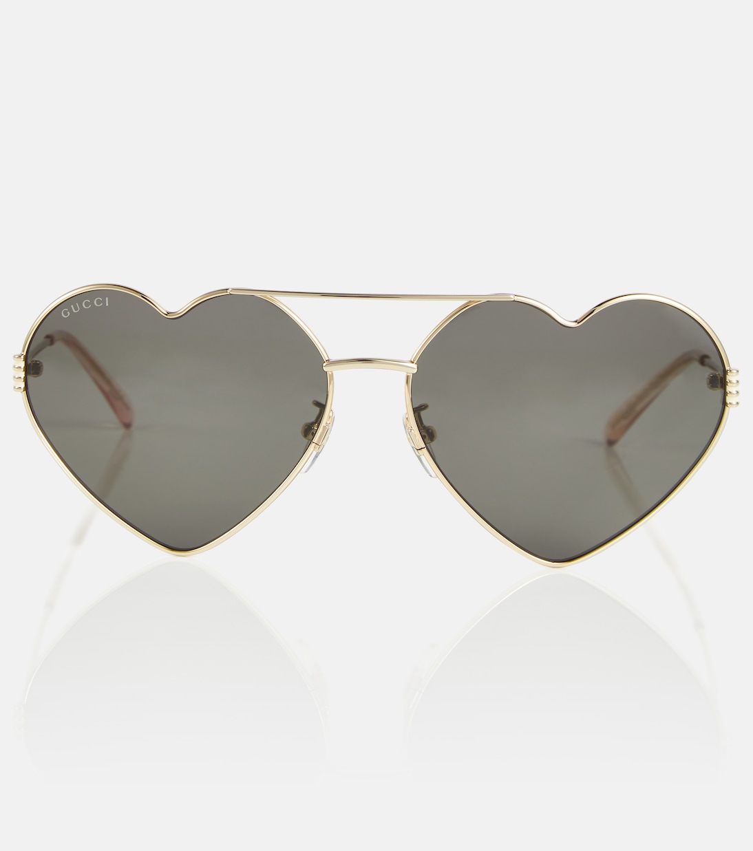 Heart-shaped sunglasses in gold - Gucci | Mytheresa