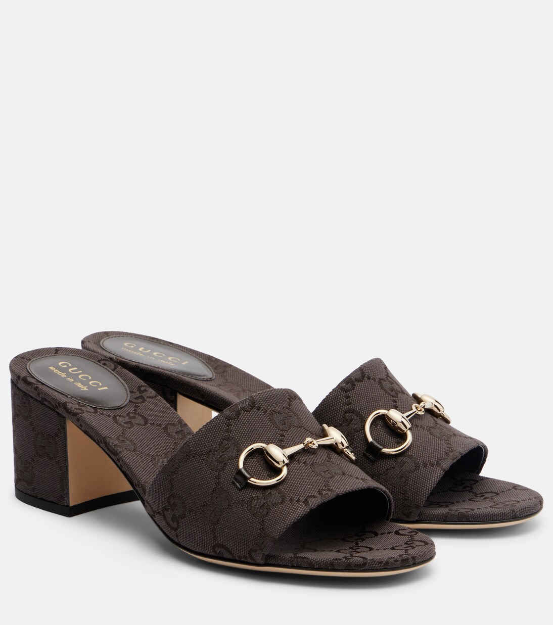 Horsebit GG Canvas mules in brown - Gucci | Mytheresa