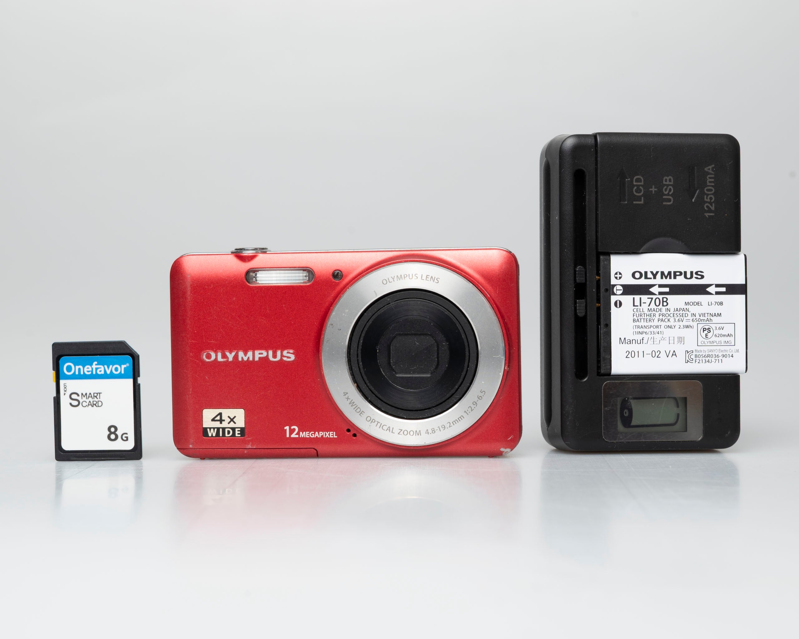 Olympus VG-110 12MP digicam w/ 8GB SD card + battery + charger