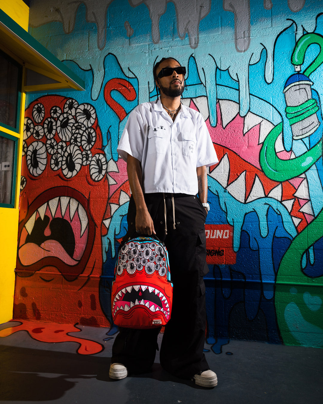 JORGE RODRIGUEZ THE ARTIST COLLAB BLINKY SHARK BACKPACK – SPRAYGROUND®