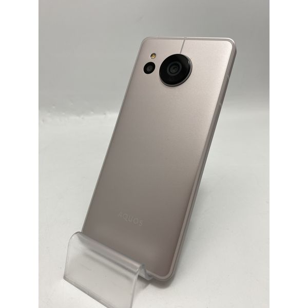 SHARP 〔中古〕AQUOS sense7 SHG10SMA ライトカッパー auSIMロック解除