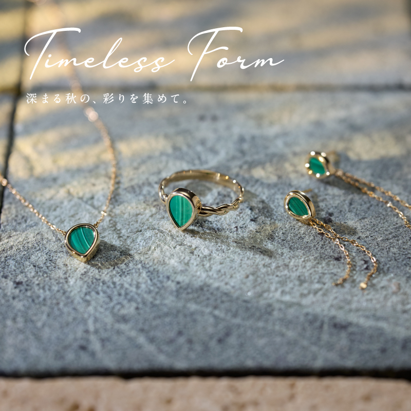 TSUTSUMI ブローチ TSUTSUMI 天然琥珀 ブローチ 18金