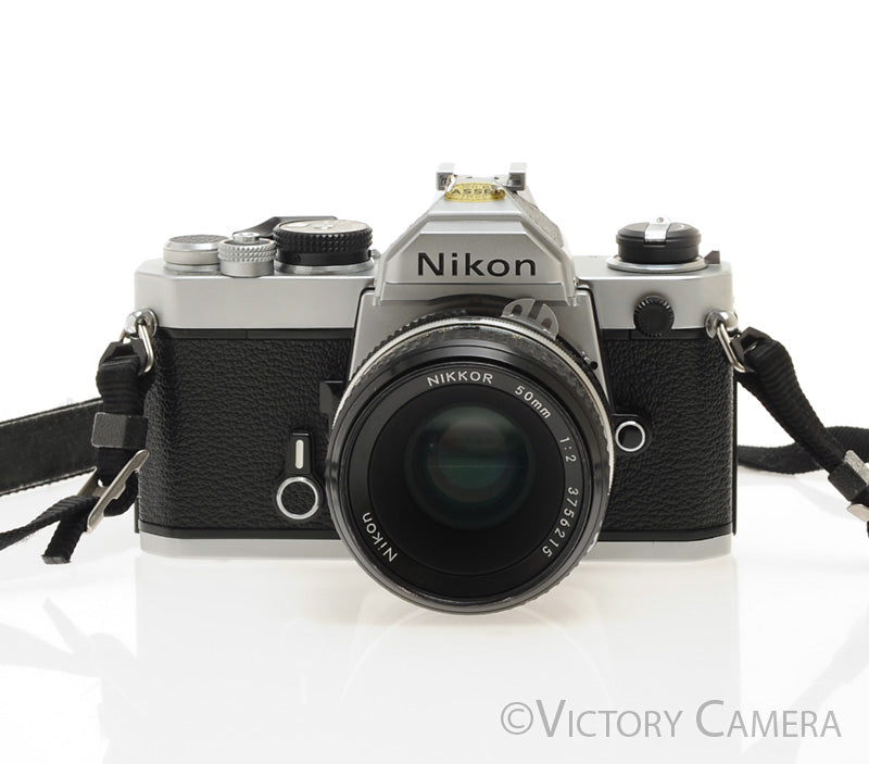 Nikon FM Chrome 35mm Film Camera w/ 50mm f2 Lens [EXC]