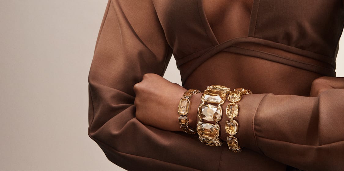 シャンパンゴールドトーン・プレーティングのウォッチ | Swarovski