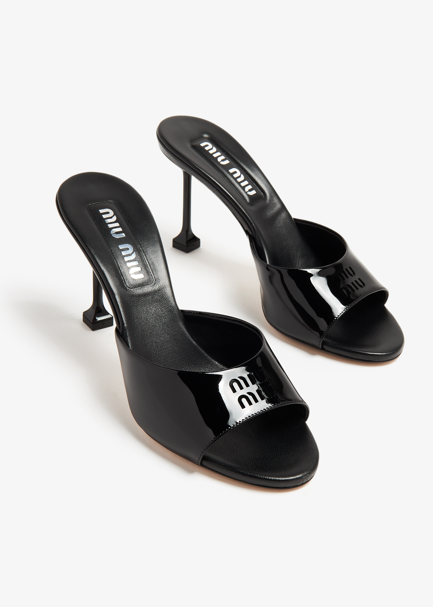 Miu Miu Patent leather mules for Women - Black in KSA | Level Shoes