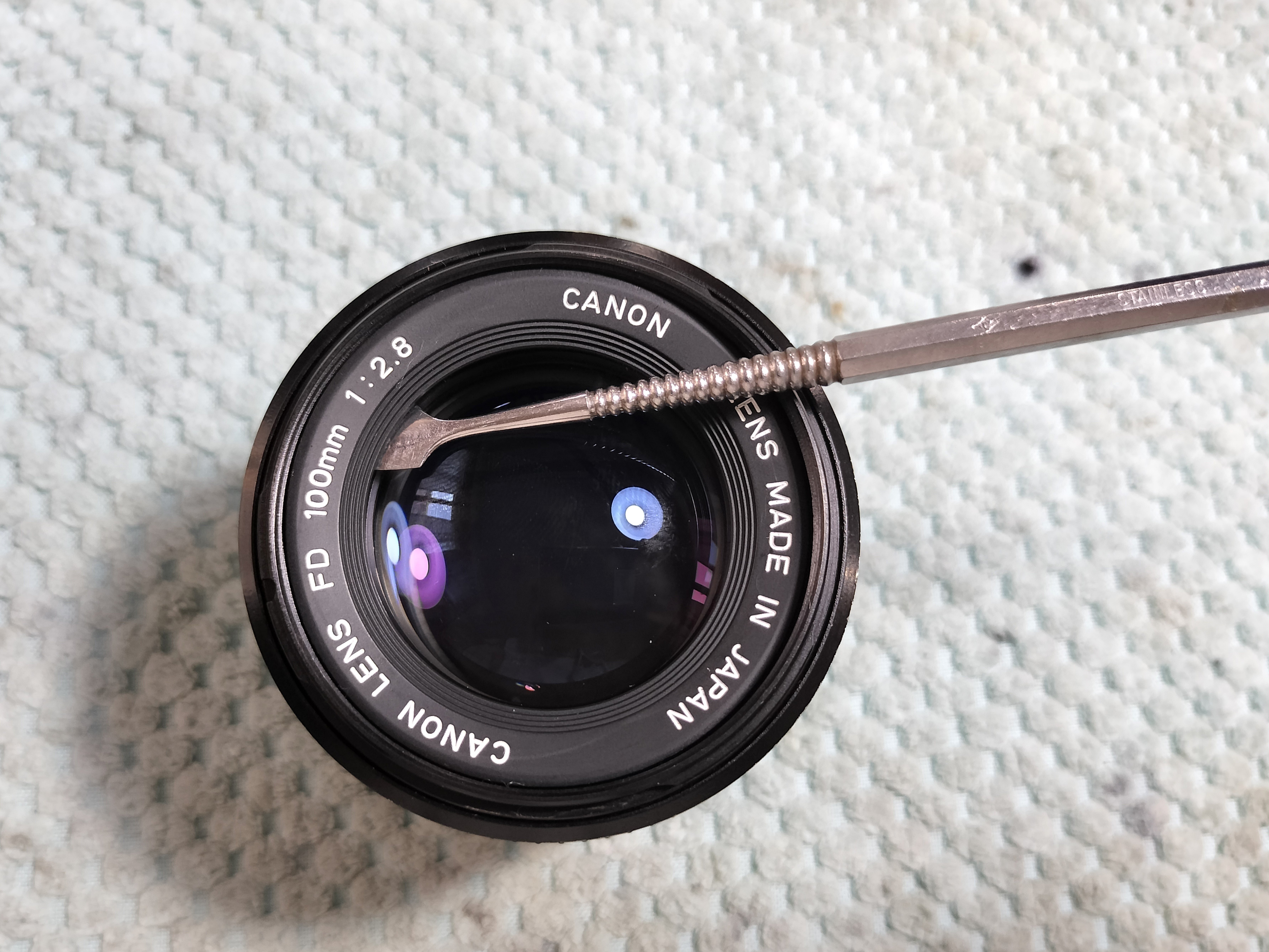 Canon New FD 100mm F/2.8の分解｜フィルムカメラ修理のアクアカメラ