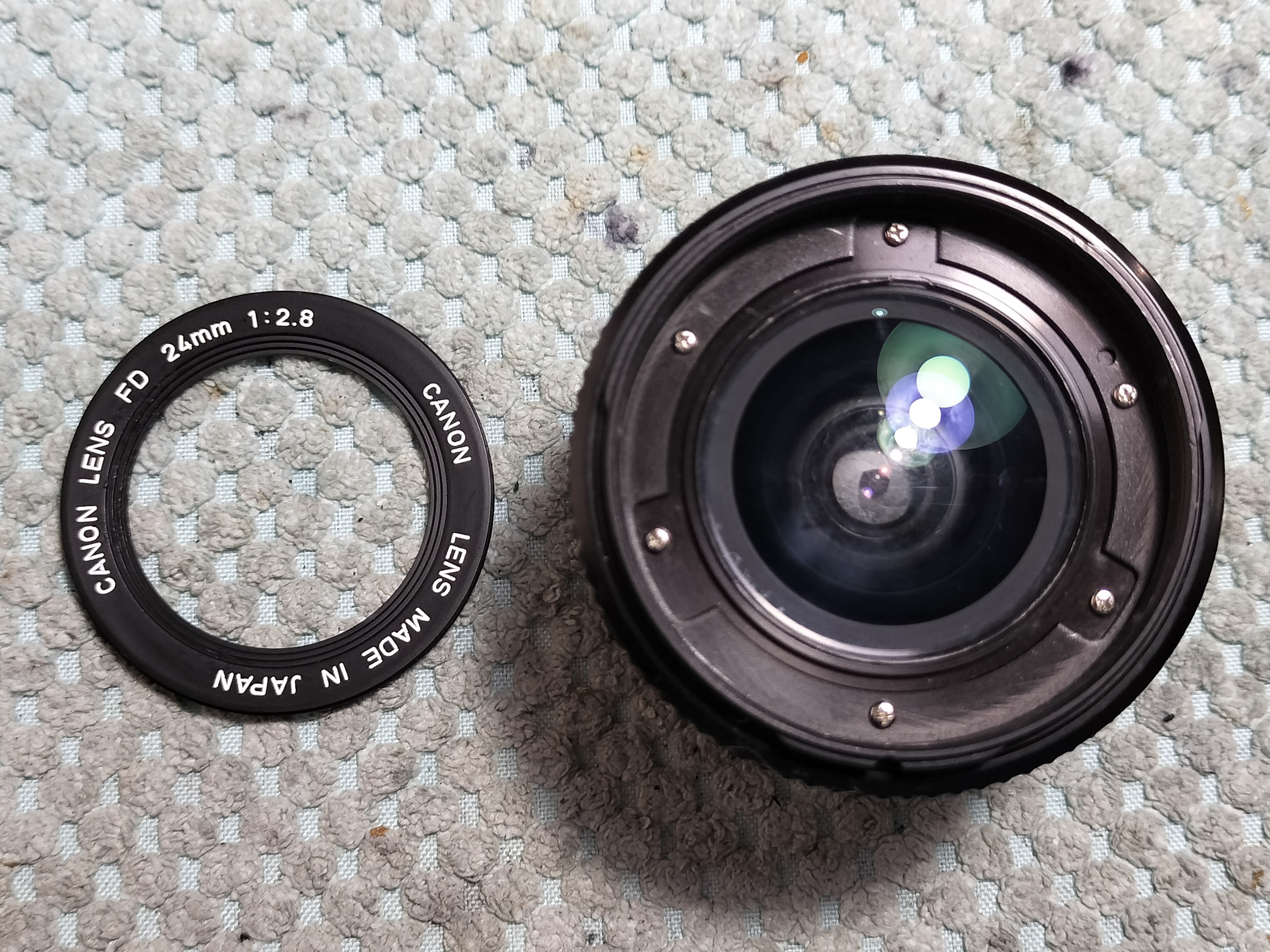 Canon New FD 24mm F/2.8の分解｜フィルムカメラ修理のアクアカメラ