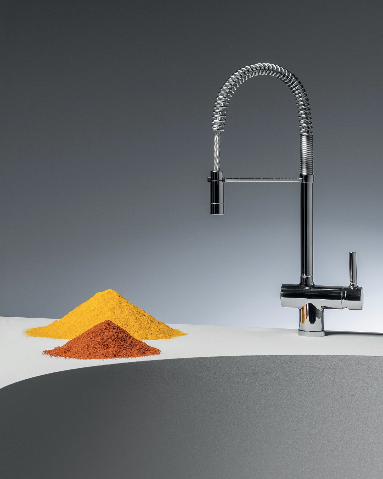 Zucchetti - ZXS single lever sink mixer with swivel spout.