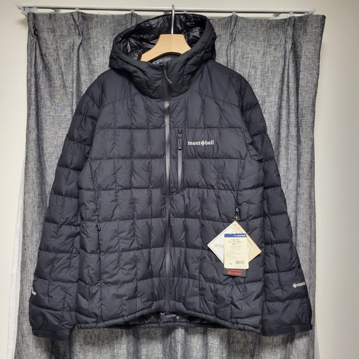 新品】モンベル イグニスダウンパーカ XL 黒 スタッフバッグ付き