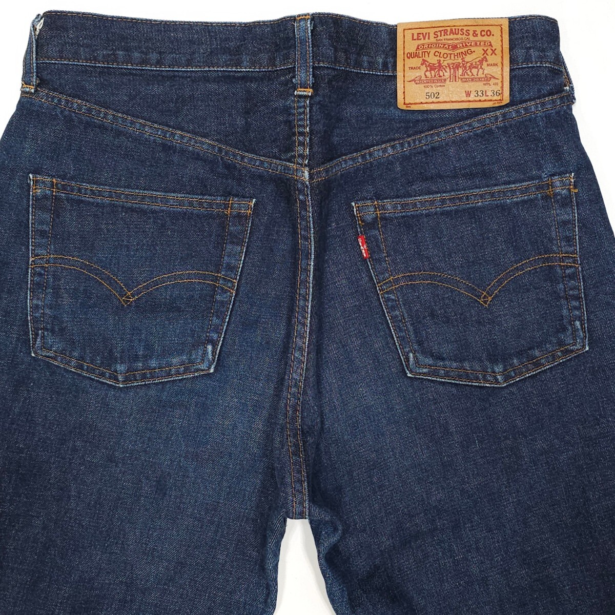 濃紺Levi'sリーバイス 502XXジーンズW33ヴィンテージ復刻テーパード赤