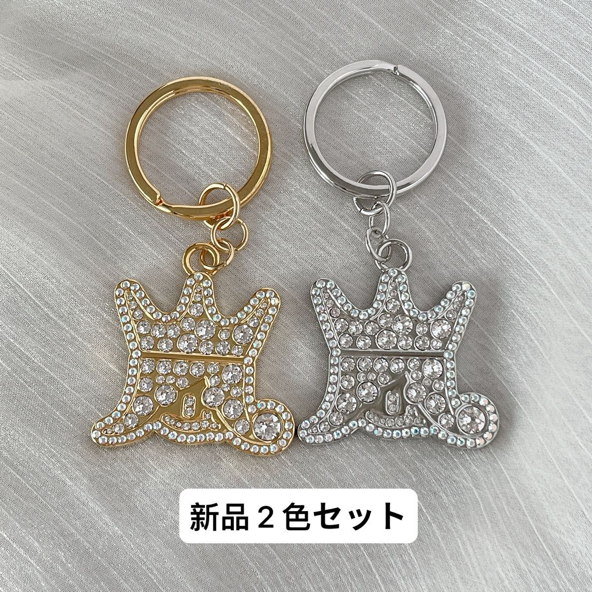 新品未使用】嵐を旅する展覧会 スワロフスキーキーホルダー ゴールド