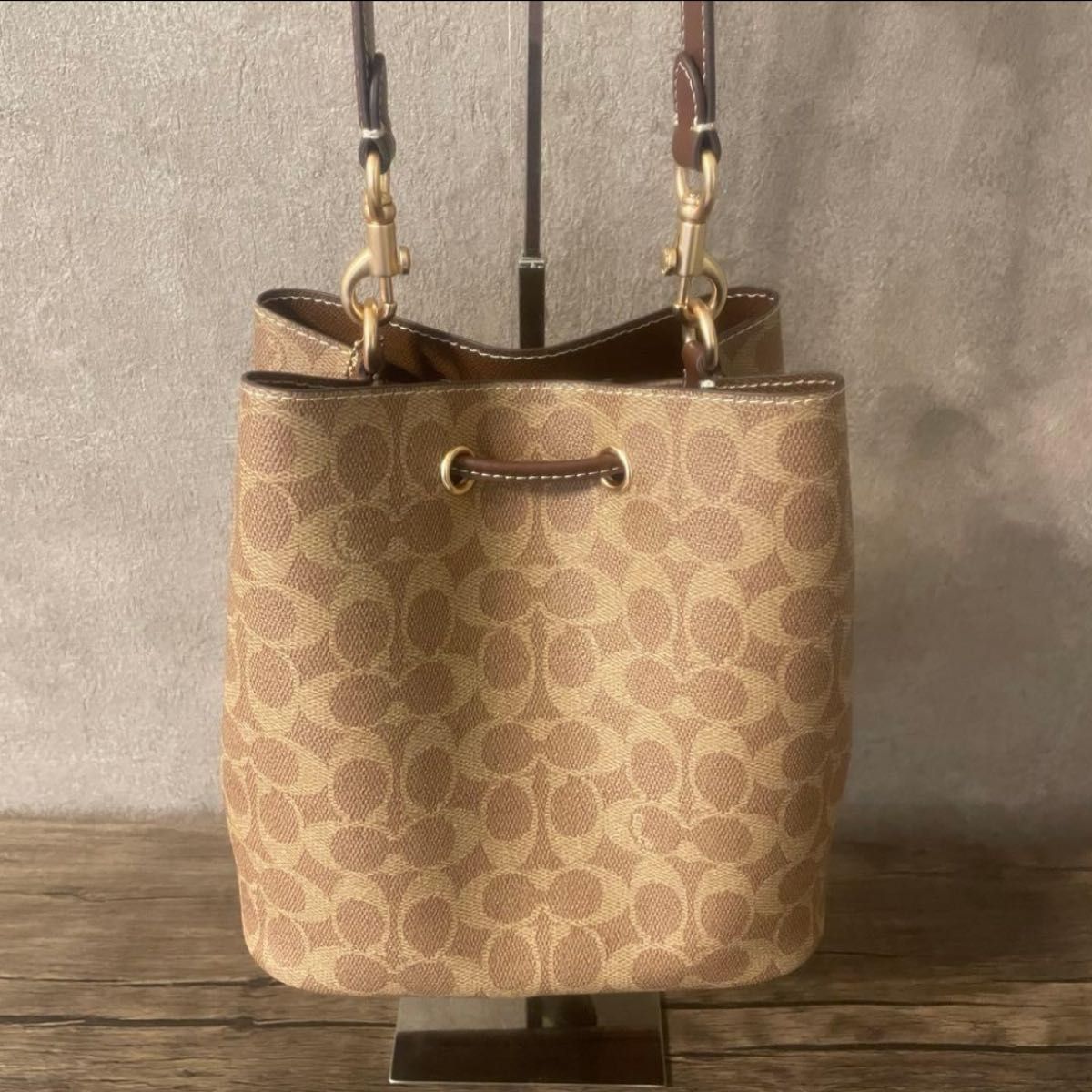 コーチ シグネチャー ローアン バケット バッグ ブラウン キャンバス