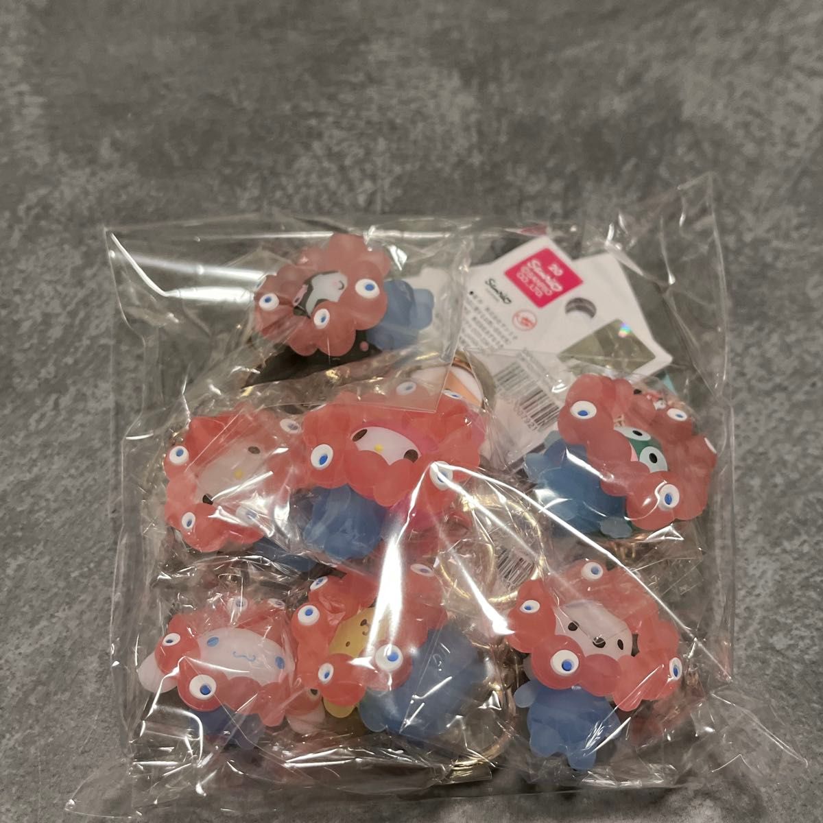 最安値】サンリオ × ミャクミャク なりきり立体マスコット クリア