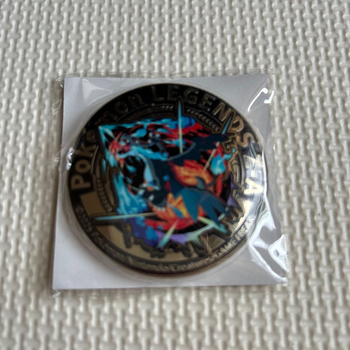 ポケモンレジェンズZA イオン 購入特典 メガリザードンX 金バッジ 缶