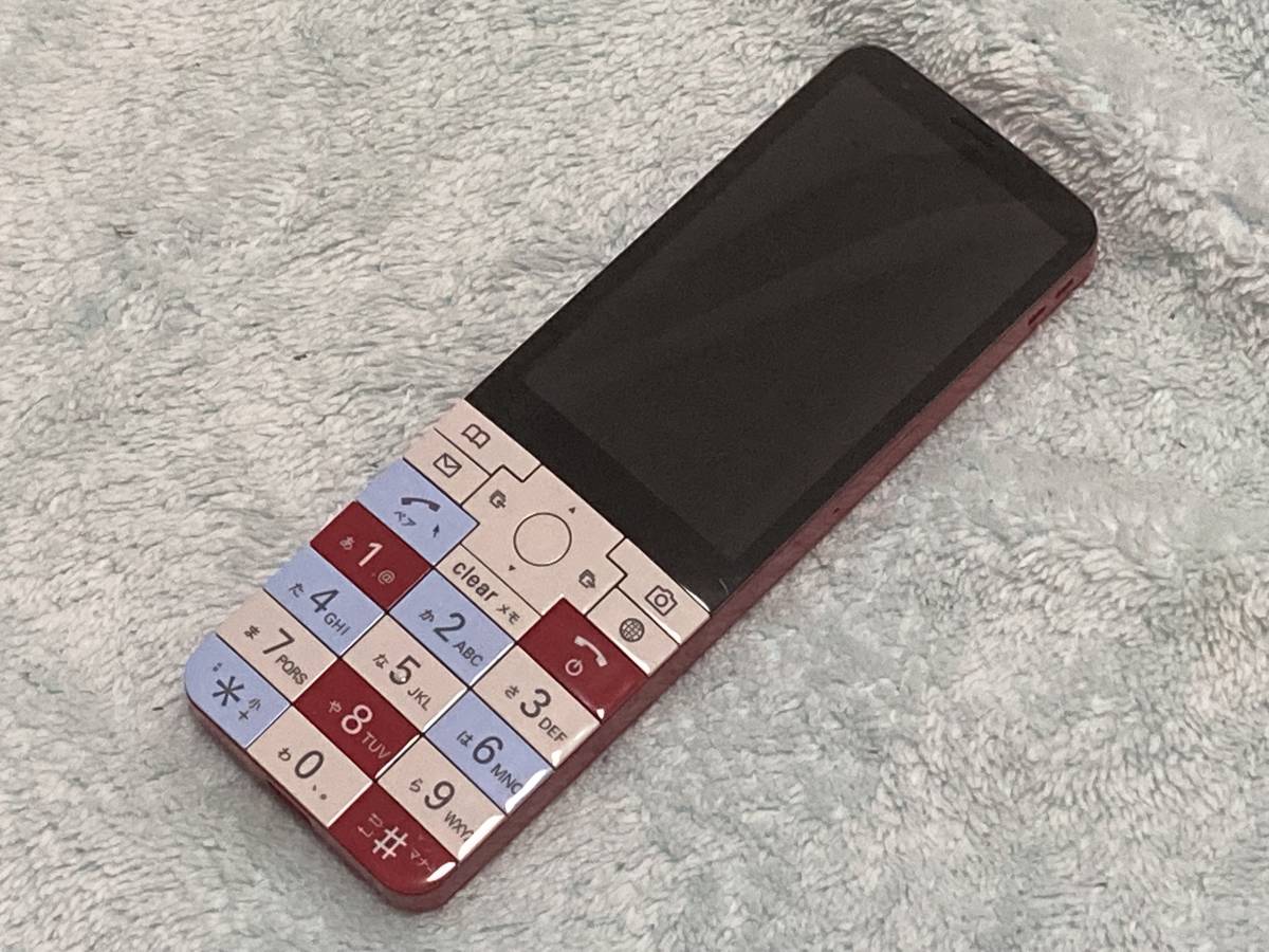 即決 au INFOBAR xv インフォバー KYX31 ニシキゴイ 充電器付/SIM