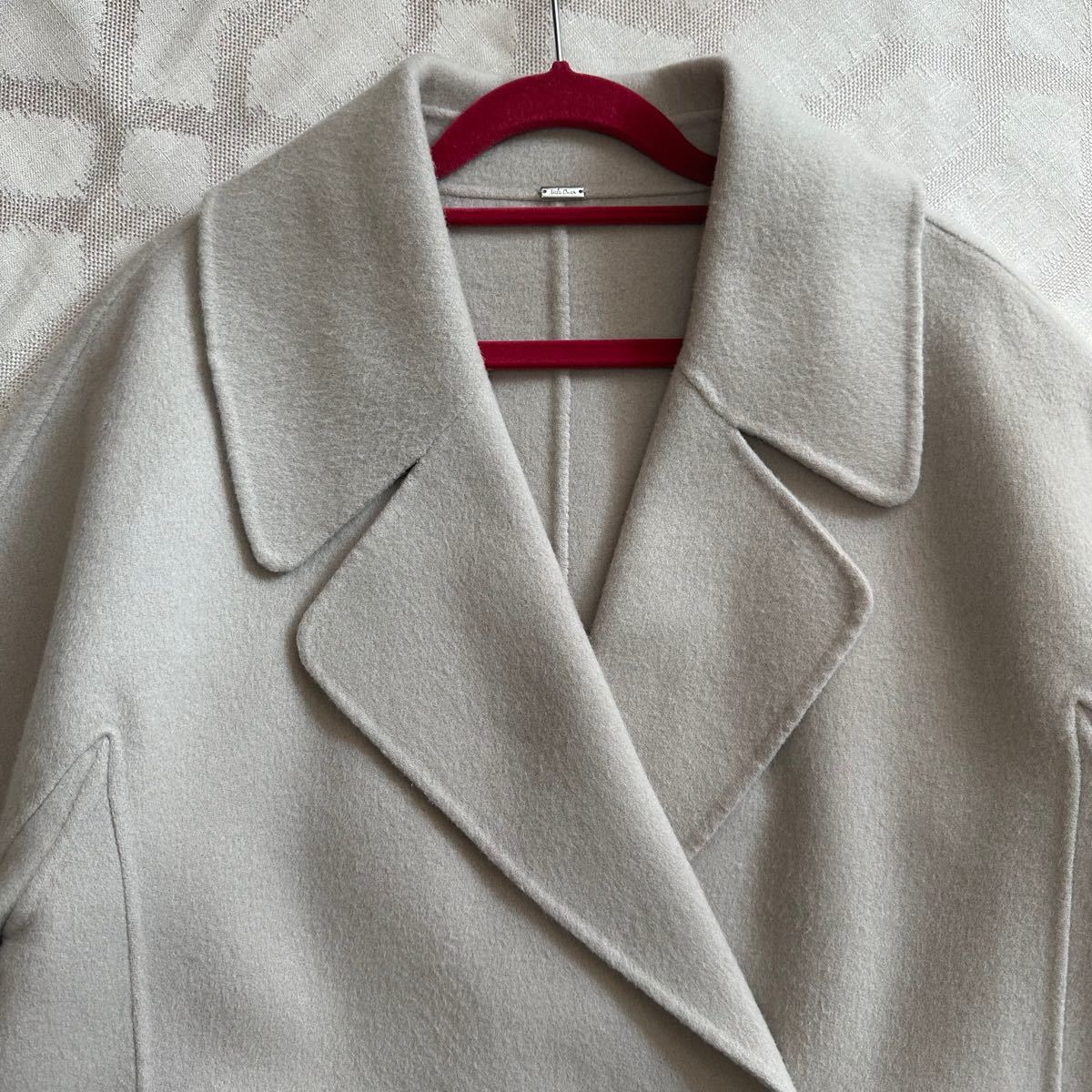 Mila Owen ミラオーウェン フラップポケット ハーフ丈コクーン接結