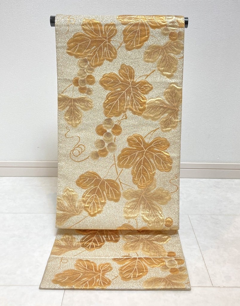 西陣名門 じゅらく 膨れ織り 葡萄唐草 袋帯 金銀糸 シャンパンゴールド