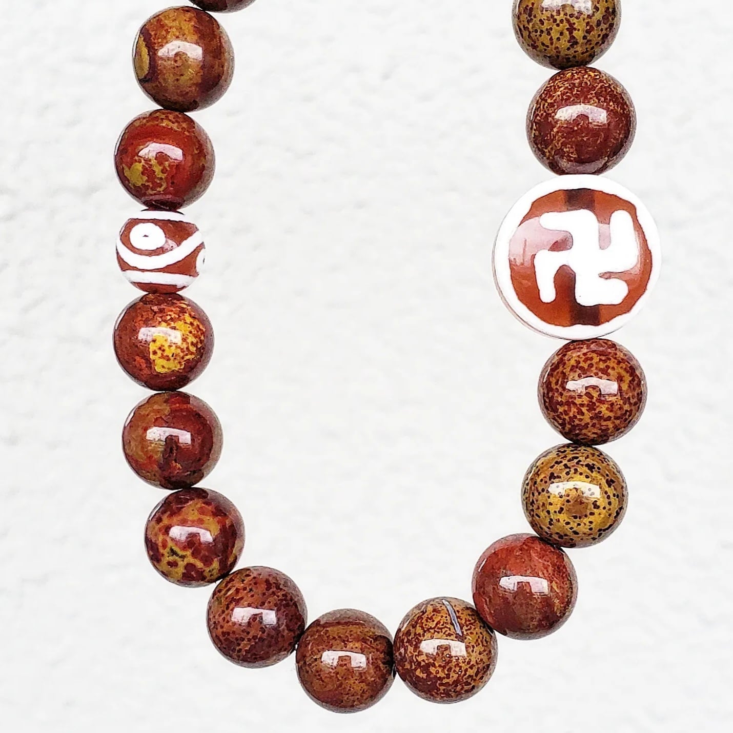 万字(卍)(まんじ)天珠 & 四眼天珠 & 戦国紅瑪瑙 | gemgem garden