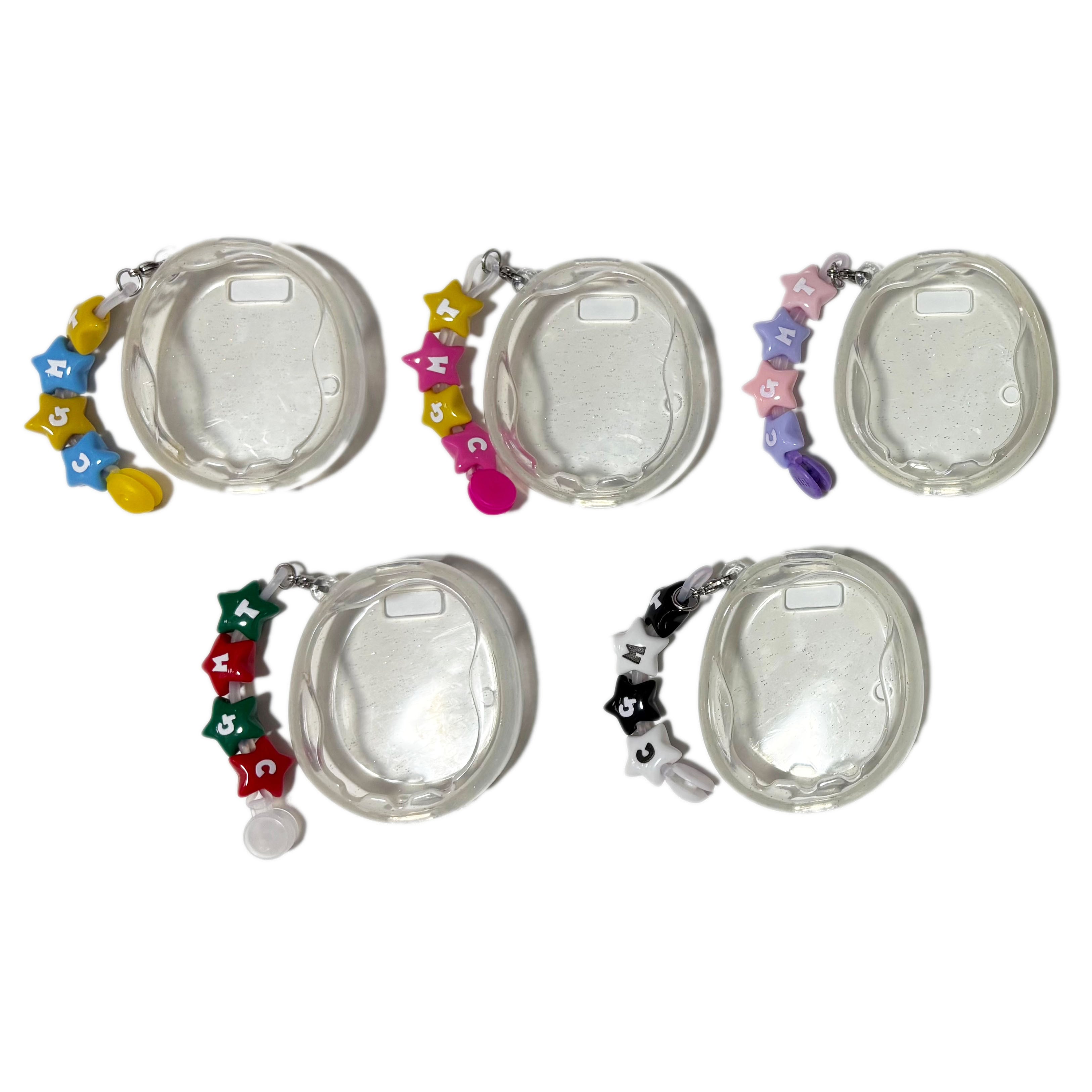 たまごっちユニのラメ入りの透明なカバー | キラメキおもちゃ