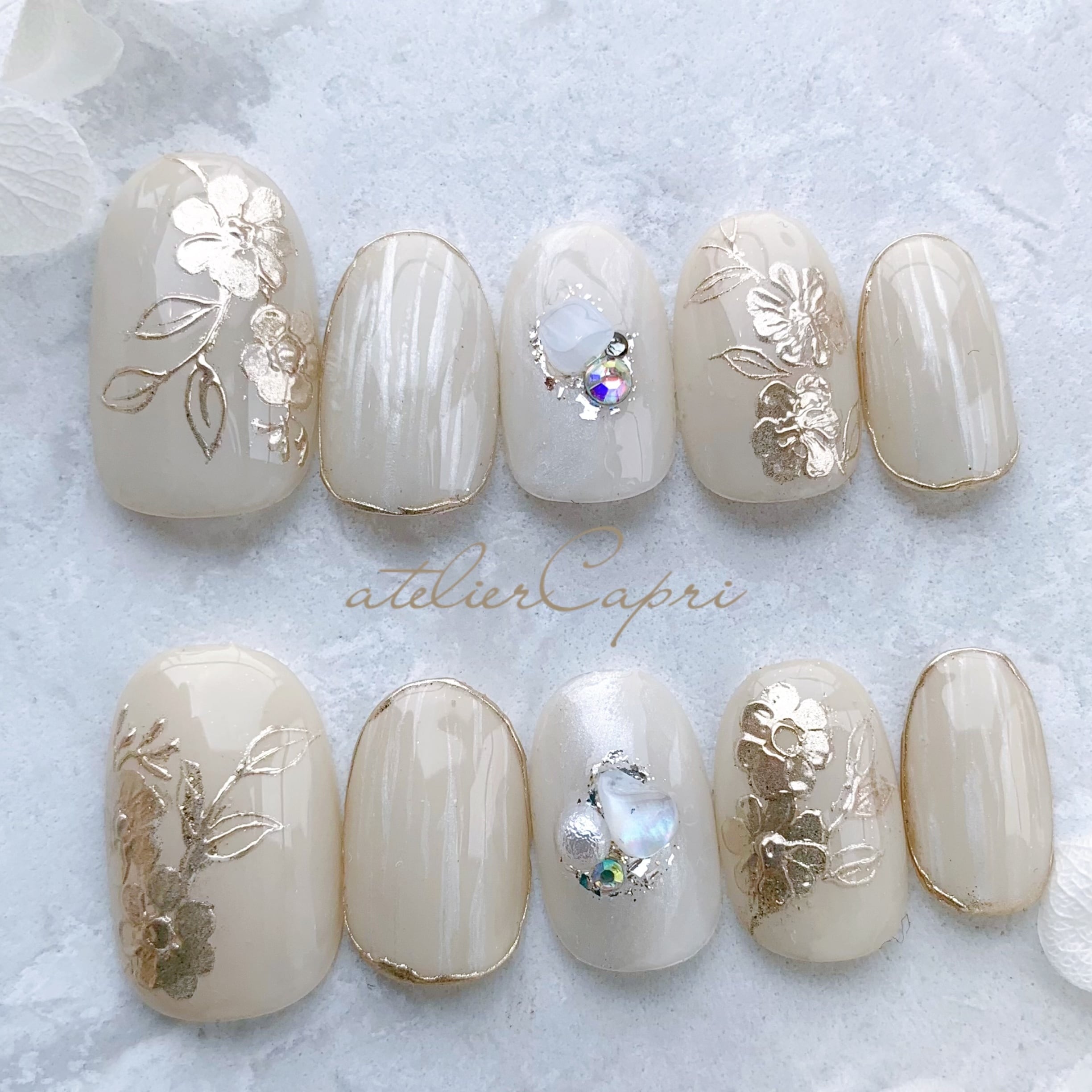 アイボリーのミラーフラワーネイル | atelier Capri