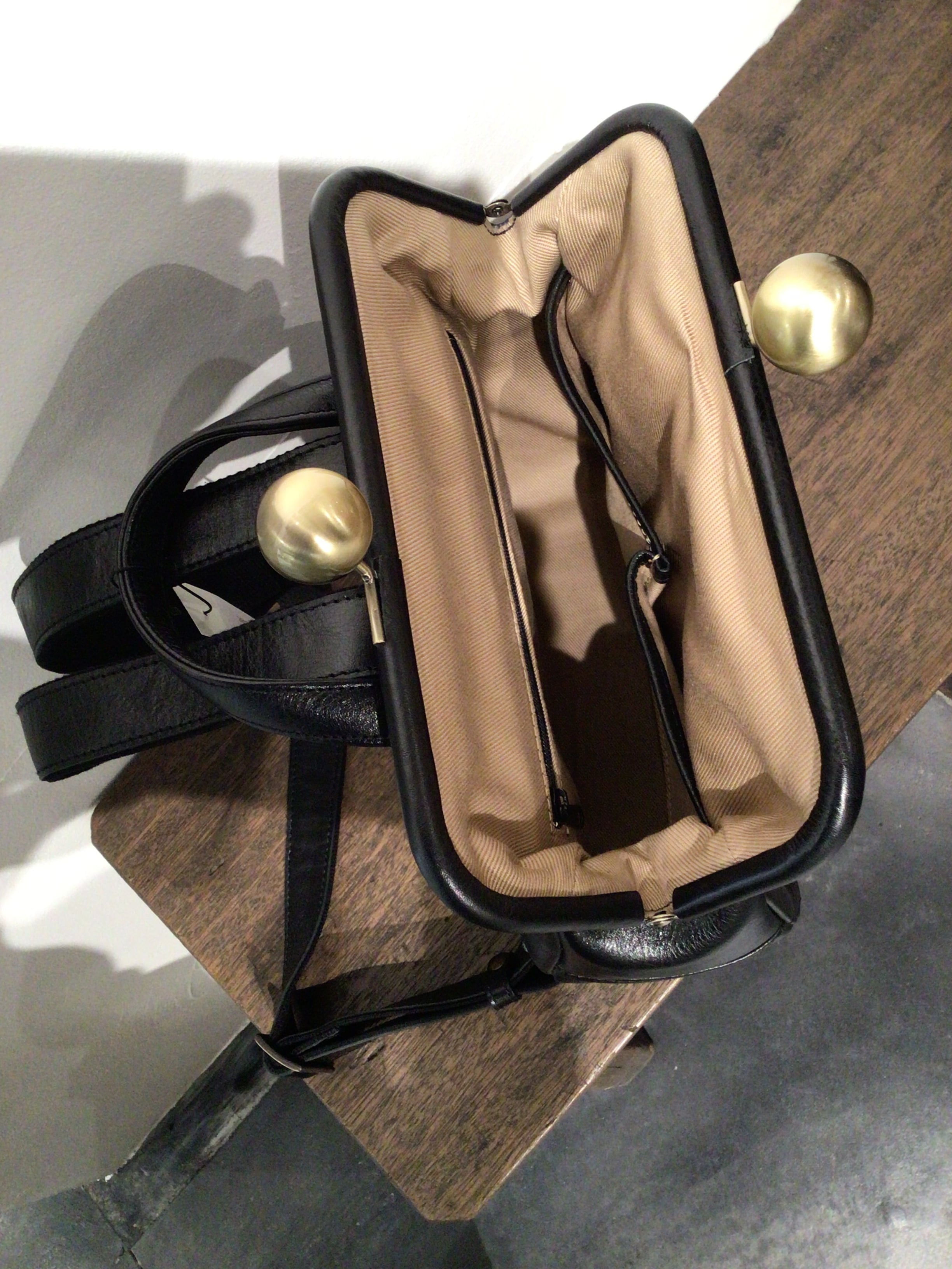 オリジナルバイカラーがま口リュック | すげ蔵