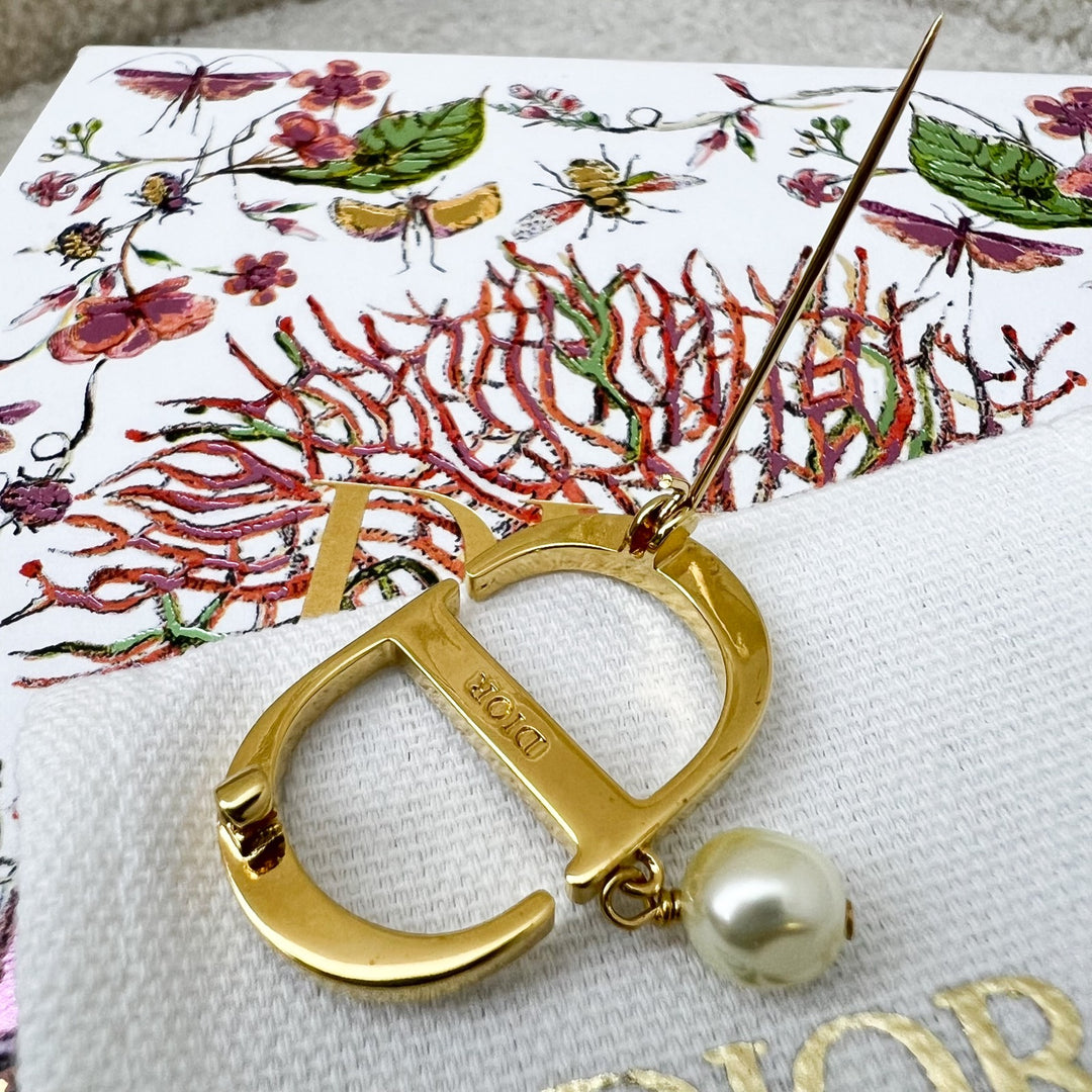 Dior Petit CD Brooch studded with Crystals and Dangling Pearl in