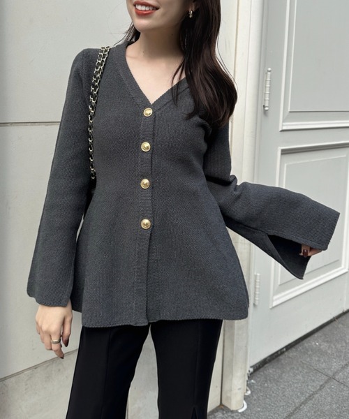 anuans（アニュアンス）の「ウエストシェイプペプラムニットジャケット