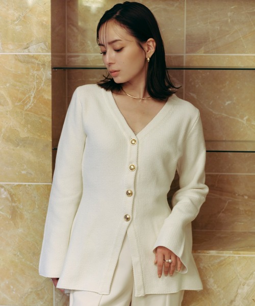 anuans（アニュアンス）の「ウエストシェイプペプラムニットジャケット