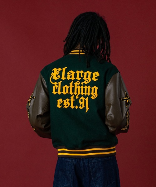 XLARGE ダークブラウン スタジャン M 袖に汚れあり 毛玉あり XLARGE